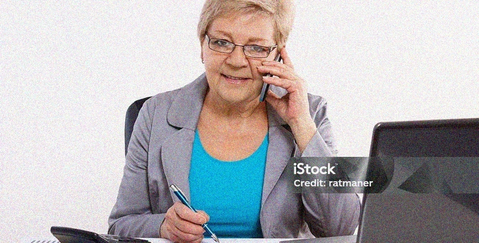 Elderly business technology training session