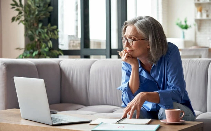 Mature adults participating in online business training